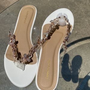 White sandals with butterflies